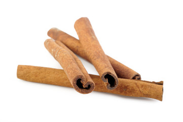 cinnamon sticks on white background