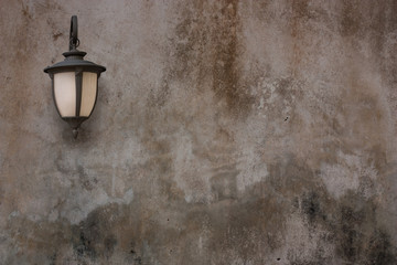 Old lamp and cement wall, Vintage style.