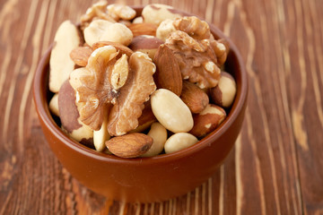 Mix nuts  on wooden background