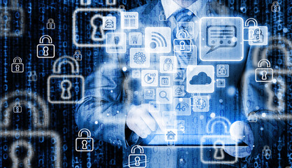 Business man using tablet PC with social media icon set