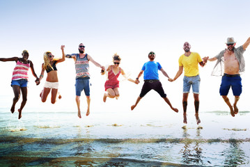 Obraz premium Diverse Beach Summer Friends Fun Jump Shot Concept