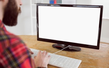 Hipster businessman working on his computer