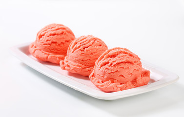 Scoops of pink fruit sherbet