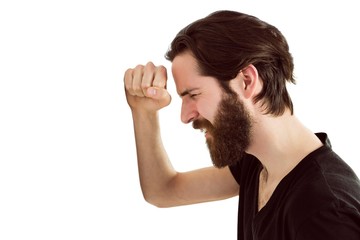 Handsome hipster feeling depressed