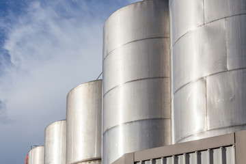 Large metal industrial tanks for petrol and oil of refinery indu