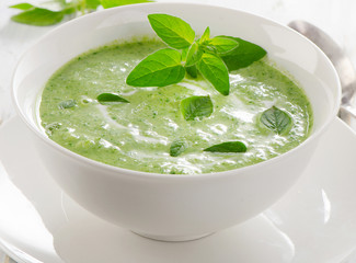 Creamy vegetable soup with fresh herbs.