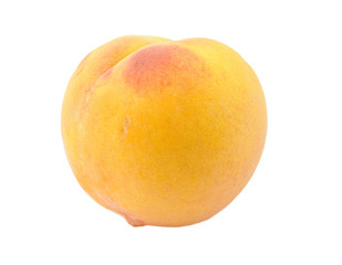 Single ripe peach isolated on a white background