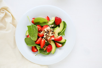 summer salad with strawberries on plate