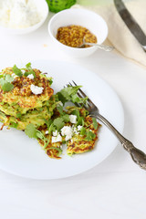 zucchini pancakes with greens and cheese