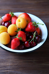 fresh fruits in white bowl