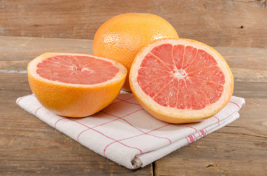 Fresh grapefruits on towel
