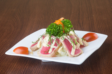 japanese cuisine. tuna sushi on the background
