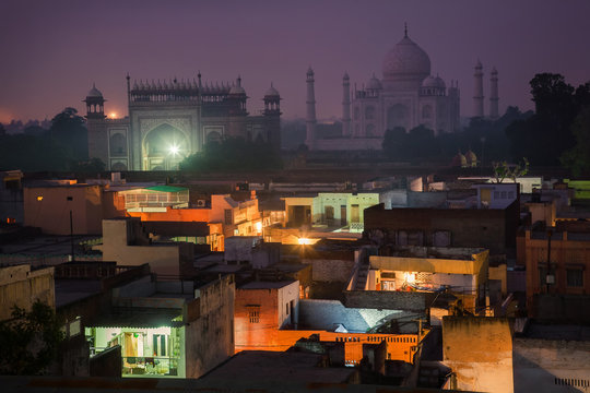 A night indian cityscape. In the shadow of the endless beauty of Taj Mahal. 