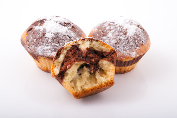 Three tasty freshly baked muffins