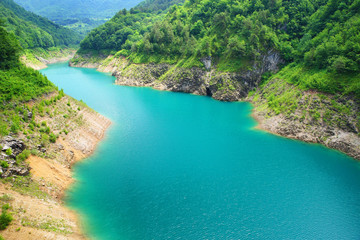 Wonderful cyan colored mountain lake. The Water is very colored.