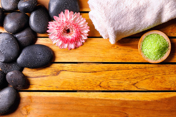 Stones with towel and bath salts top view
