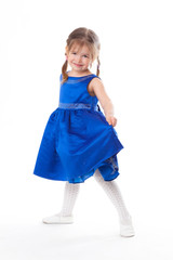 cute little girl posing in blue dress