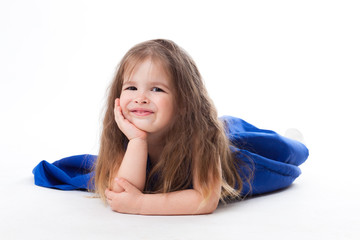 Fototapeta premium cute little girl posing in blue dress
