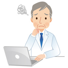 パソコンを操作する医者　困る