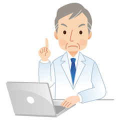 パソコンを操作する医者　注意
