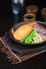japanese cuisine. hot plate fish on the background