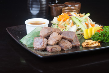 japanese cuisine. beef cube on the background
