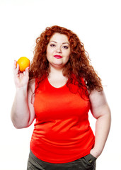 the fat woman with orange juice vegetable fruit holding isolated on the white background