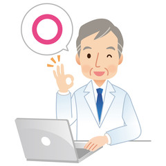 パソコンを操作する医者　オーケーサイン