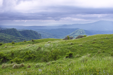 Fototapeta premium View on green hills and mountains in Georgia