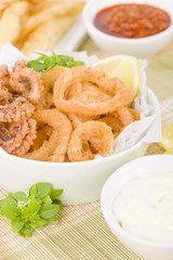 Calamari - Deep-fried squid rings served with garlic mayo and chili sauce.
