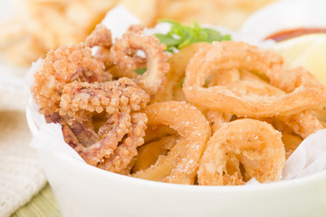 Calamari - Deep-fried squid rings served with garlic mayo and chili sauce.
