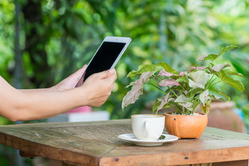 hands woman using tablet