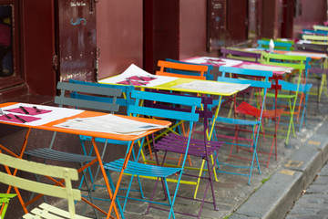 Paris - Very colorful Parisian outdoor cafe in Montmartre