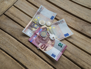 Cash Euro and key for small business deal