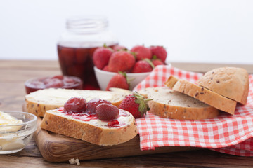 overhead view on healthy breakfast with strawberry jam