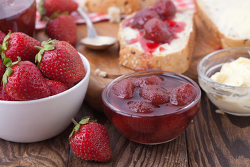 overhead view on healthy breakfast with strawberry jam