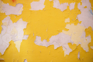 Background of old yellow painted wall
