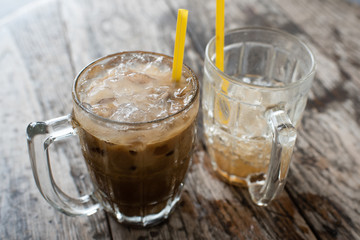 Iced Milk Coffee (selective focus on the glass which is full)