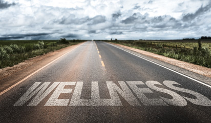 Wellness written on the road