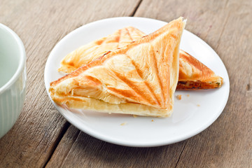Tuna puff. Tuna sandwich on wood table.