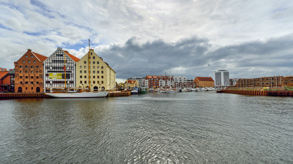 The riverside with the characteristic promenade of Gdansk, Poland.- panorama