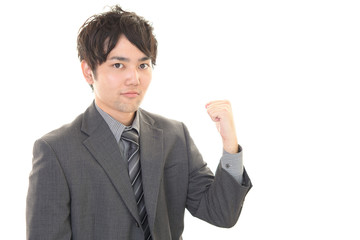 ガッツポーズのビジネスマン