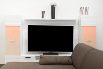Wohnzimmer mit großem TV Fernseher Plasma Flatscreen LCD LED