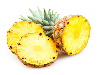 Pineapple with slices isolated on white