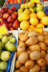 Naklejka na ściany i meble Organic fruit/Various organic fruit arranged on stall in supermarket. Raw food