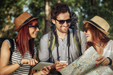 Three Tourists Sightseeing Nature