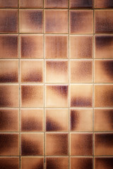 Old pattern brown ceramic bathroom wall tile texture and backgro