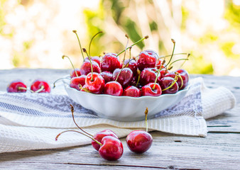 fresh red cherry in a plate,healthy snack, summer, selective foc