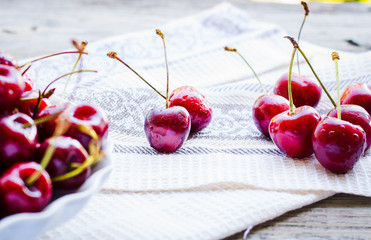 fresh red cherry in a plate,healthy snack, summer, selective foc