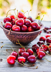 fresh red cherry in a plate,healthy snack, summer, selective foc